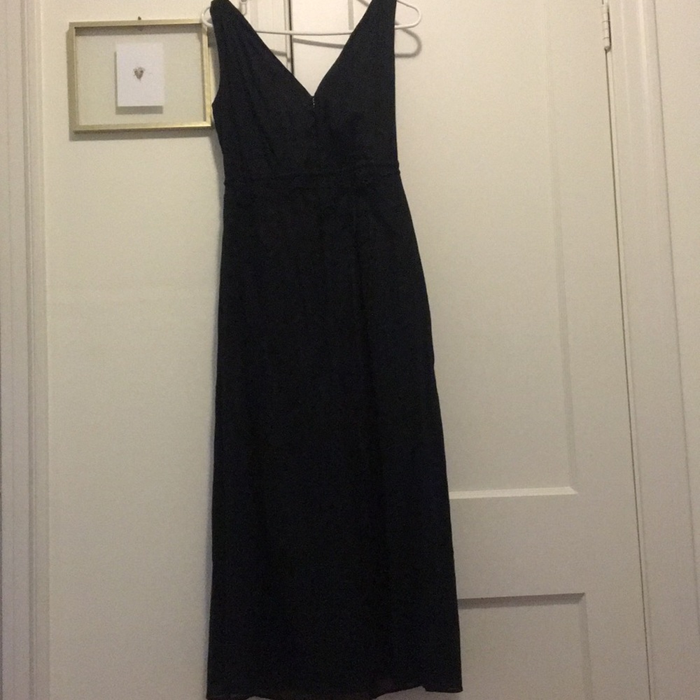 Cotton blend midi black dress with pockets.